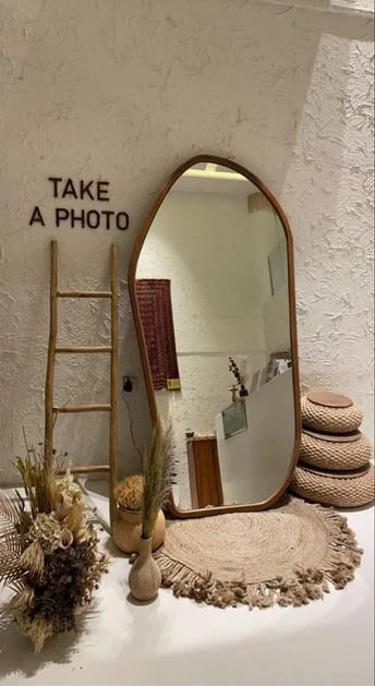 mirror and sign in store